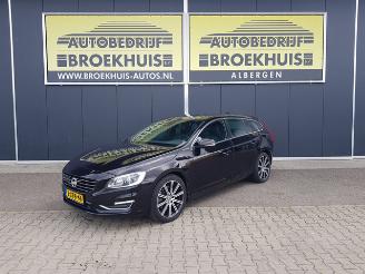 Damaged car Volvo V-60 2.4 D6 AWD Plug-In Hybrid Pure Limited 2014/7
