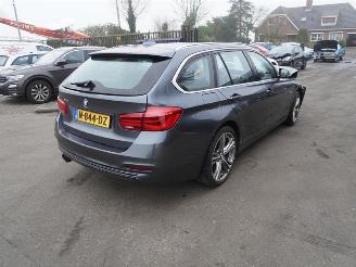 skadebil auto BMW 3-serie Touring 330d xDrive 2017/3