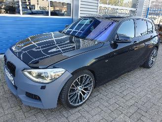 skadebil auto BMW 1-serie 114i Business+ 2013/2