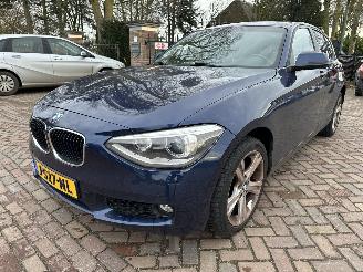 Damaged car BMW 1-serie 114d High Executive 2013/5