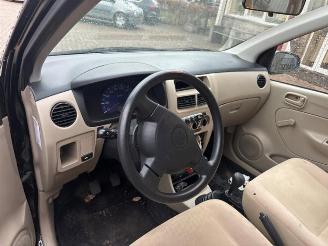 Daihatsu Cuore Cuore (L251/271/276), Hatchback, 2003 1.0 12V DVVT picture 4