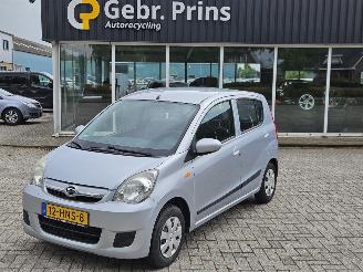 Schadeauto Daihatsu Cuore 1.0 12V DVVT Hatchback  Benzine 998cc 51kW (69pk) FWD 2009/1