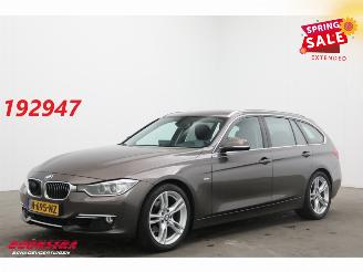 Damaged car BMW 3-serie Touring 320i Aut. Luxury BiXenon Navi Clima Cruise SHZ PDC 2013/2