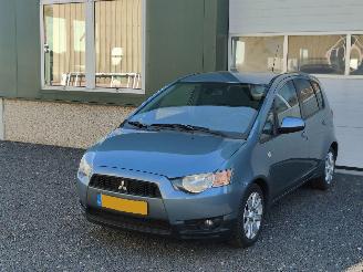 skadebil auto Mitsubishi Colt 1.3 Edition Airco Cruise Tr.haak 2012/2