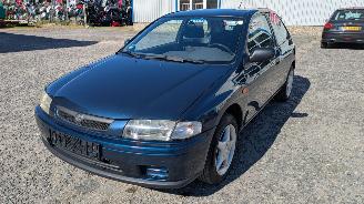 Salvage car Mazda 323 1.4 1997/11