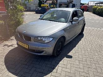 Damaged car BMW 1-serie 116 I High Executive 2010/3