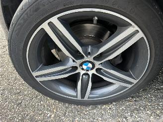 BMW 1-serie 118i 136pk 6-bak Cent Sportline 5drs - schuifdak - nap - leer - navi - stoelverw - licht + regensensor picture 50