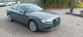 Schadeauto Audi A5 Sportback 2.0-TDI Automaat Navi Xenon Led Climatecontrol CruiseControl Stoelverwarming Lichtautomaat Regensensor pdc Control 18-inch audi velgen Afneembare trekhaak 2016/2