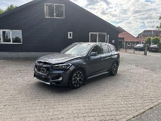 Schadeauto BMW X1 HYBRIDE AUTOMAAT PANORAMADAK LEER NAVI CLIMA B.J 2020 2023/4