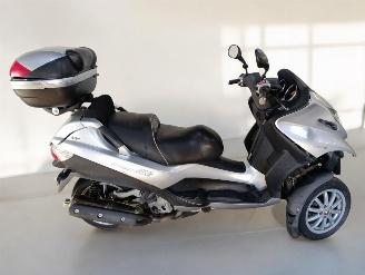 skadebil bromfiets Piaggio  MP3 2010/6