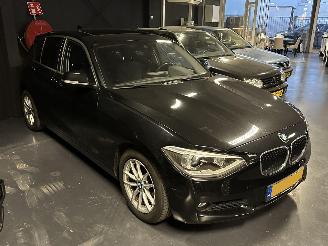 damaged passenger cars BMW 1-serie 116i Pano Automaat 2013/8