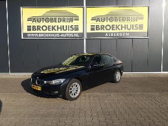 Damaged car BMW 3-serie 320i Executive 2012/5