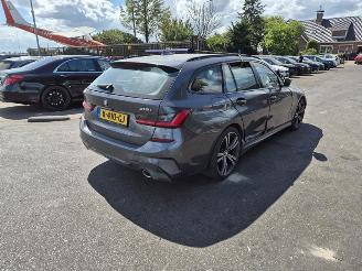 damaged passenger cars BMW 3-serie 318i Touring 2021/1