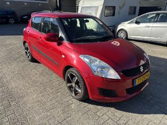 Damaged car Suzuki Swift 1.2 5-drs Comfort Airco 2013/3