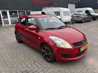 Damaged car Suzuki Swift 1.2  5-drs Comfort airco 2013/3