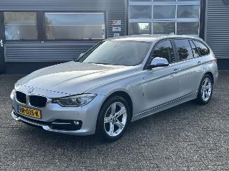 damaged passenger cars BMW 3-serie 318D Touring High Executive Automaat 2015/4