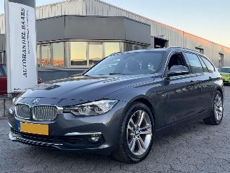 Schadeauto BMW 3-serie Touring 320i Luxury Edition 2018/11