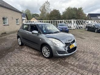 damaged passenger cars Suzuki Swift 1.2 Comfort EASSS 2013/2