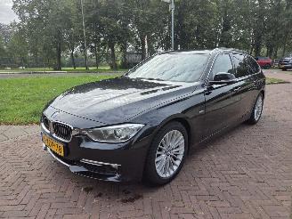 Schadeauto BMW 3-serie 320D LUXERY 2014/7