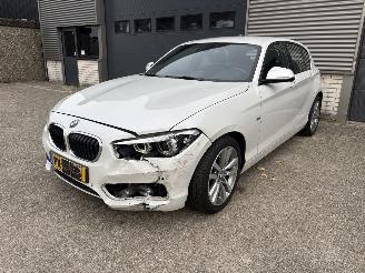 Coche accidentado BMW 1-serie 118i SPORT / AUTOMAAT / LEER / NAVI / CRUISE / PDC 2017/10
