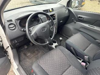 Daihatsu Cuore Cuore (L251/271/276), Hatchback, 2003 1.0 12V DVVT picture 4