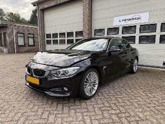 skadebil auto BMW 4-serie 420i Cabrio High Executive Automaat Navi Memory 2014/11