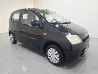 damaged passenger cars Daihatsu Cuore 1.0 12V AUT 3.Drs 2003/5