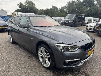damaged passenger cars BMW 3-serie 318i Luxury Edition 2018/9