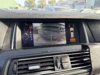 BMW 5-serie 520i luxury edition picture 12