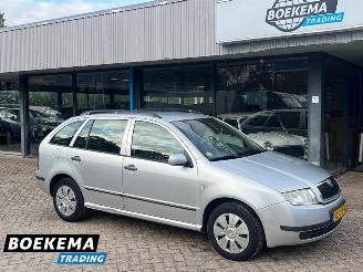 Damaged car Skoda Fabia Combi 1.4-16V Choice Airco Cruise PDC 2004/6