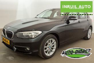 Damaged car BMW 1-serie 118i Automaat 114.929 km NAP Airco 2017/10