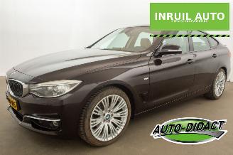 damaged passenger cars BMW 3-serie 320i GT Automaat Navi Clima Leder High Executive 2013/7