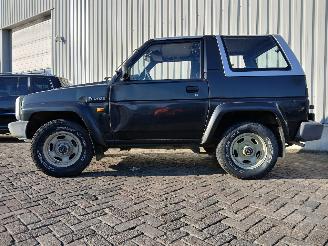 Daihatsu Feroza Feroza Soft Top (F300) Terreinwagen 1.6 DX,EL,SE 16V (HD-E) [70kW]  (1=
0-1988/12-1997) picture 4