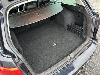 Volkswagen Passat 1.4 TSI 122pk dsg aut + f1 Highline - nap - dvd in hoofdsteunen - navi - clima - cruise - leer + stoelverw picture 14