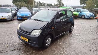 Démontage voiture Daihatsu Cuore 2006 1.0 12v EJVE Zwart X05 onderdelen 2006/7