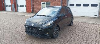 Schadeauto Hyundai I-10 Bj:11-2024 Prime Edition 1.2-mpi Digital Cockpit Navigatie Climatecontrol CruiseControl Stoelverwarming Lichtautomaat Privacyglas keyless Entry Stuurwiel met verwarming Achteruitrijcamera 4xElektrische ramen Elektrische-spiegels Led Dagrijverlichting mist 2024/11