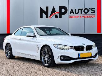 damaged passenger cars BMW 4-serie 420d Cabrio High Executive 2014/1